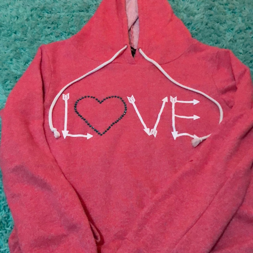 This is a pink long sleeve crop top